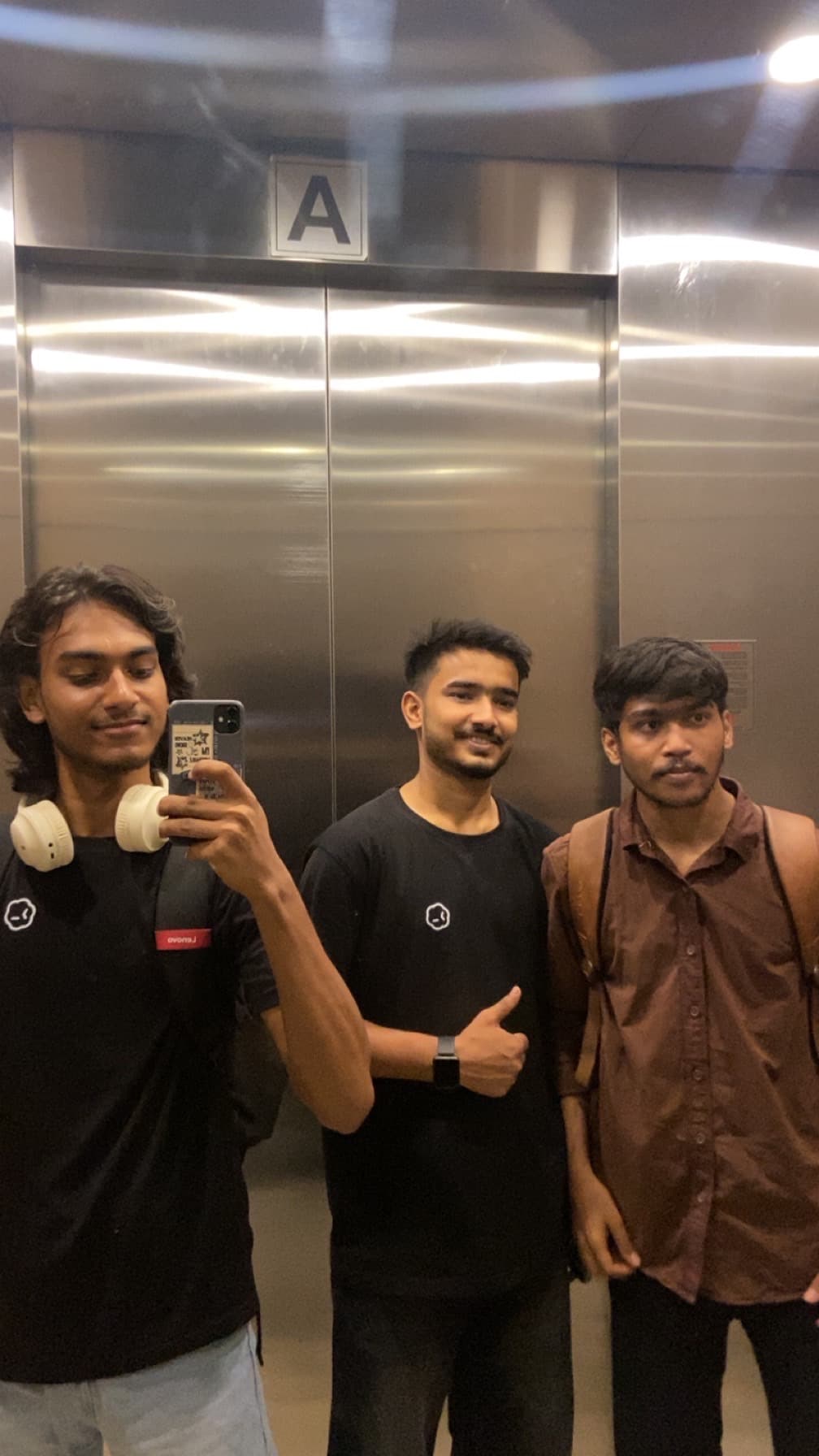 Elevator lobby, matching tees